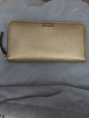 kate spade Metallic Gold Zip-Around Wallet with Logo Plaque